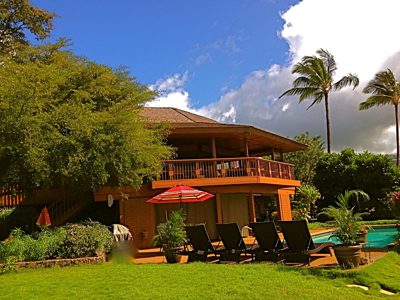 The pool deck from the lower lawn.
