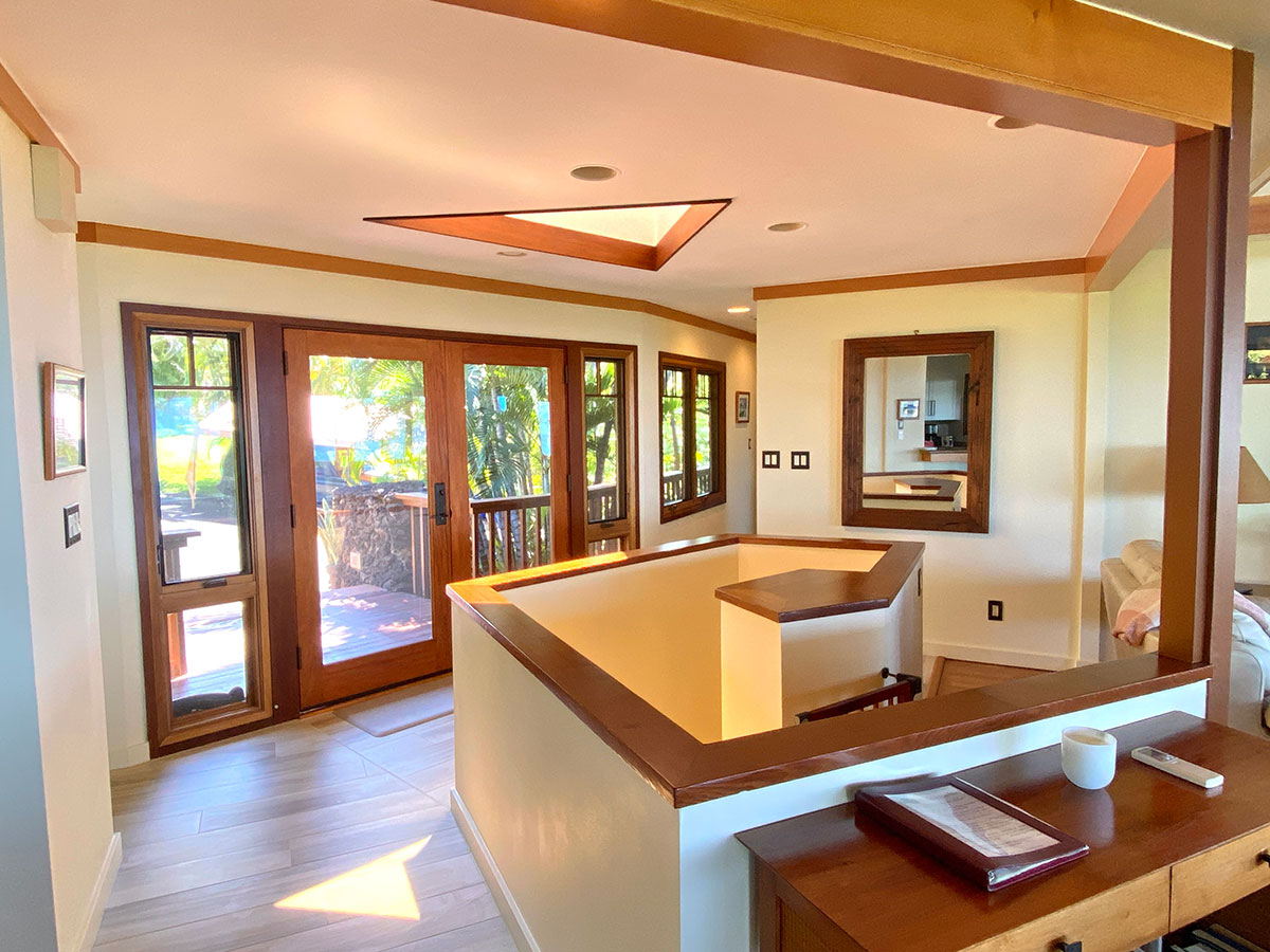 The living area and entry towards the front door.